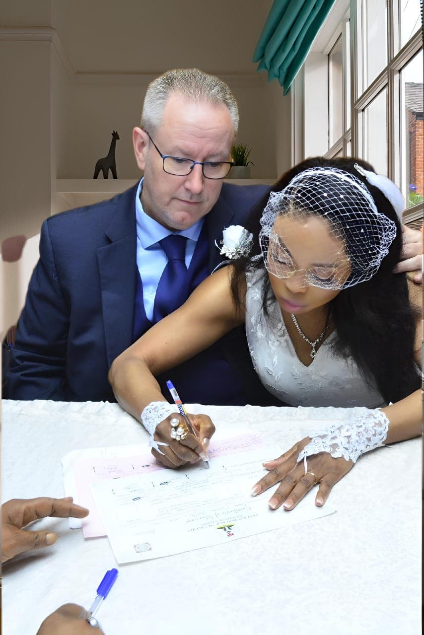 Ola with her husband on their wedding day